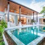 Luxury Dubai villa with private swimming pool and outdoor terrace seating