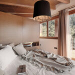 Elegant designer bedroom with modern decor in luxury Dubai apartment